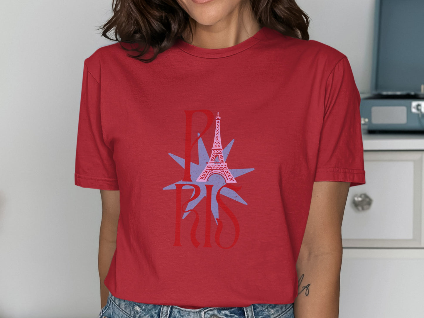 Red t-shirt with "PARIS" text and Eiffel Tower graphic.