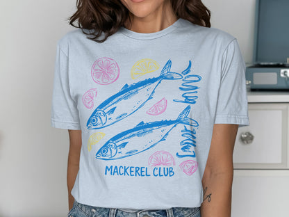 Light blue t-shirt with two blue mackerel and lemon slices, "Mackerel Club" text.