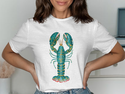 White t-shirt with a detailed teal and gold lobster graphic.