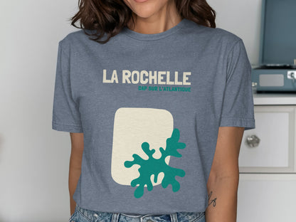 Blue t-shirt with "La Rochelle Cap sur l'Atlantique" and coral graphic.