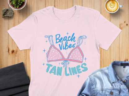 Pink t-shirt with "Beach Vibes" and a polka dot bikini graphic.