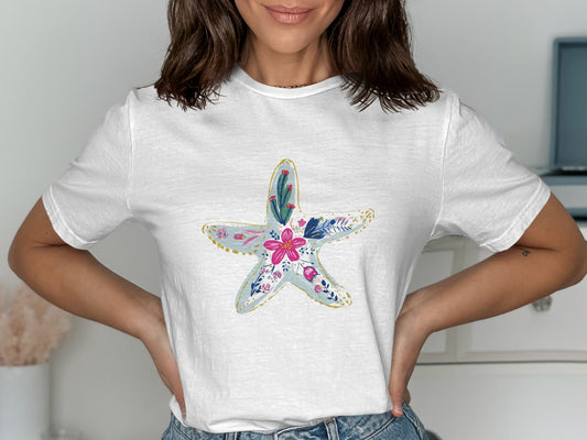 White t-shirt with a floral-patterned starfish design.