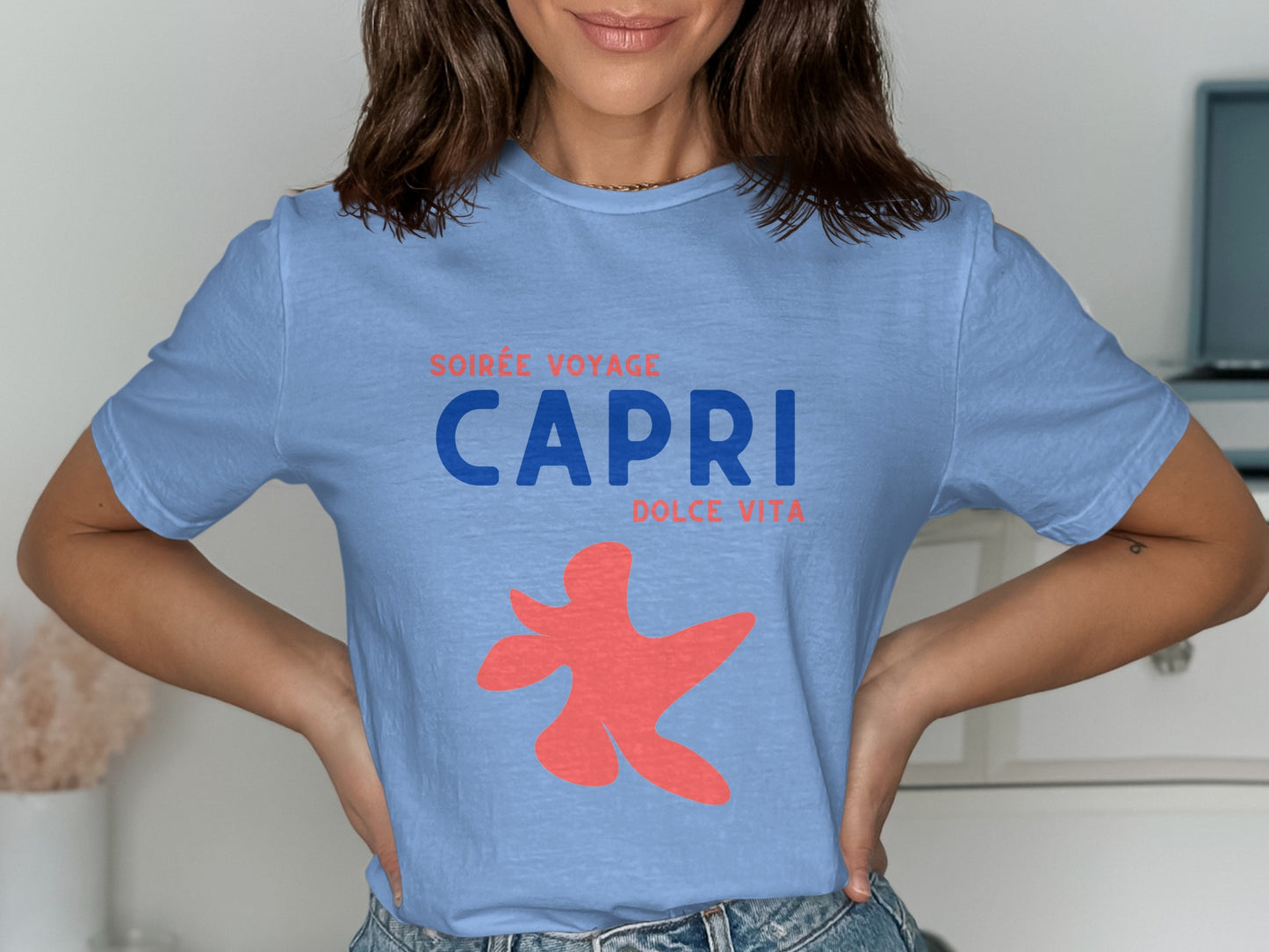 Light blue t-shirt with red starfish graphic and "CAPRI DOLCE VITA" text.