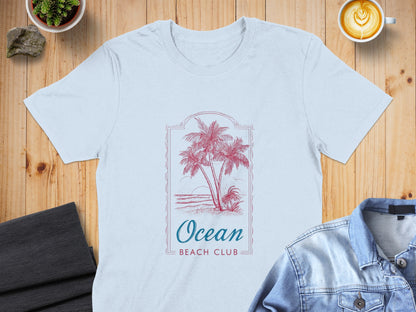 Light blue t-shirt with "Ocean Beach Club" and palm trees graphic.